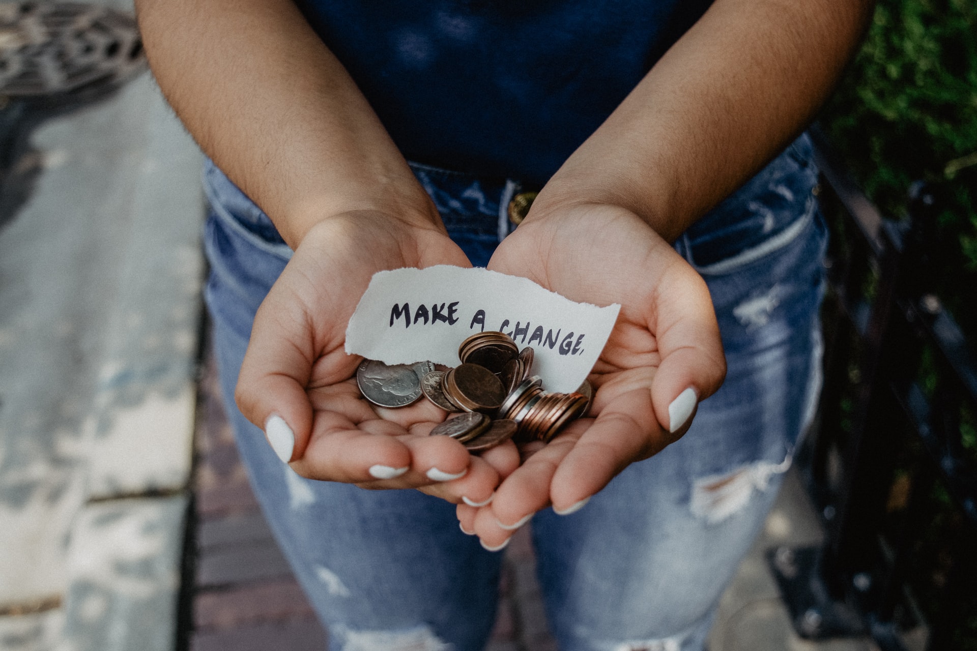 woman-holding-coins