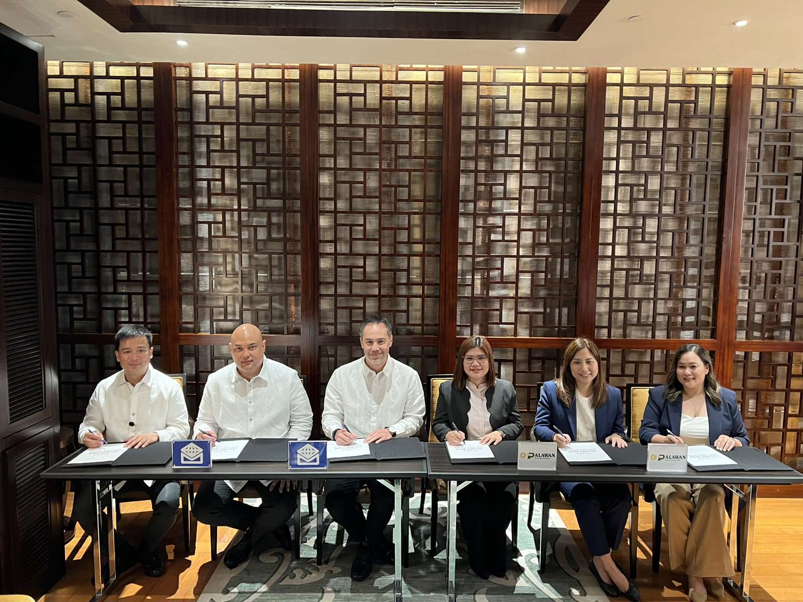 Palawan Group of Companies and Metrobank executives sign the “CollectAnywhere” project together