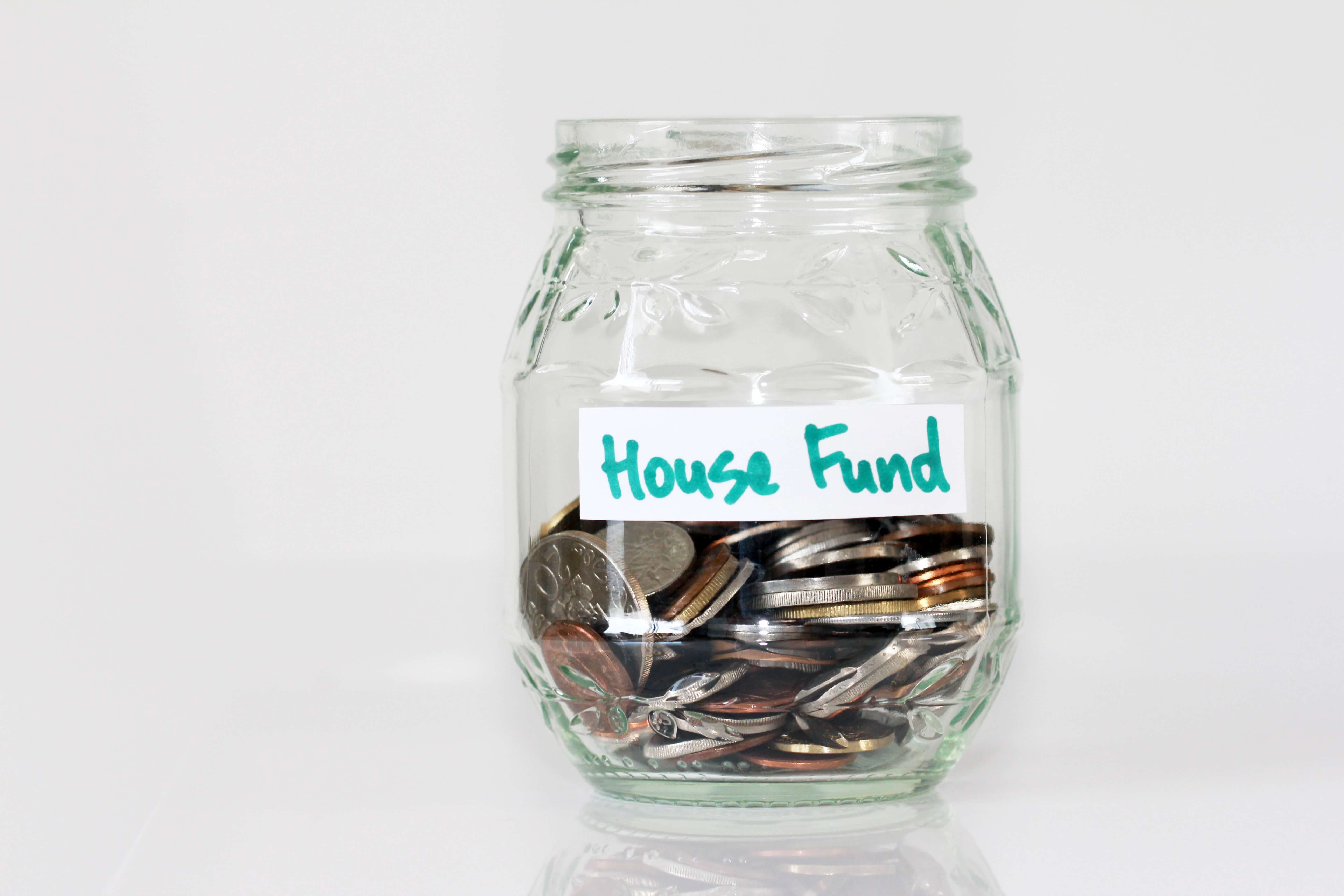 house-fund-glass-with-coins