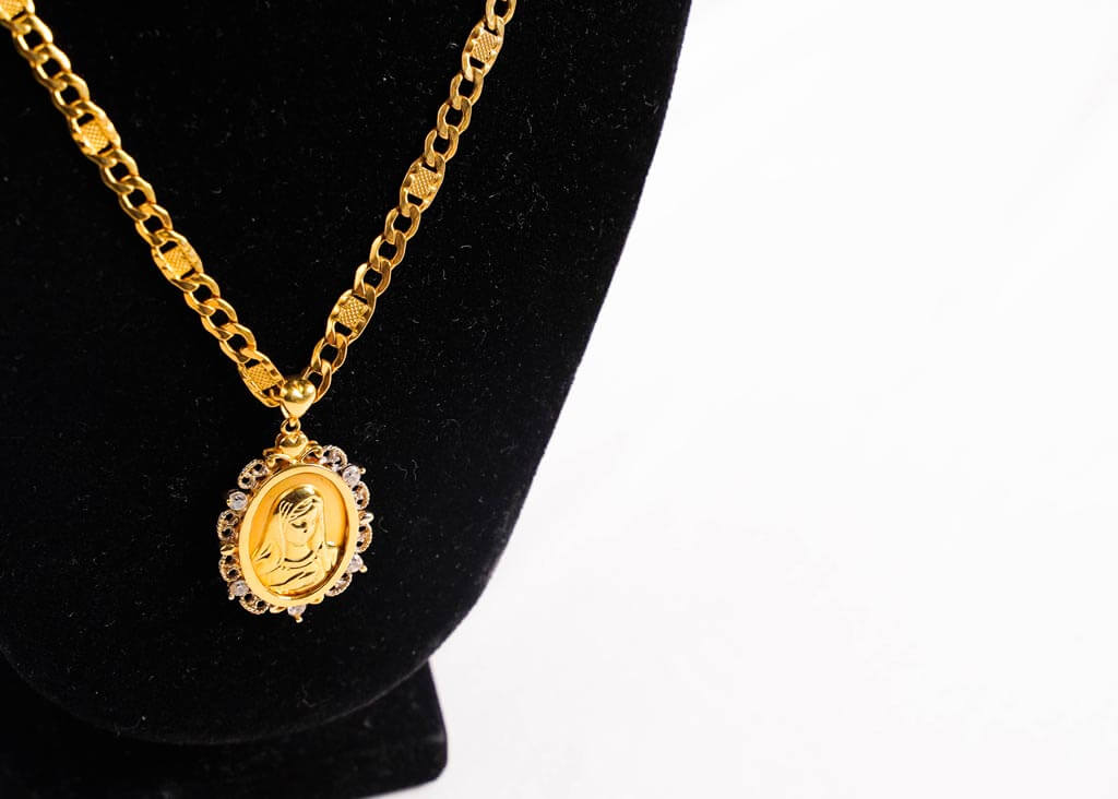 Gold necklace with Virgin Mary pendant